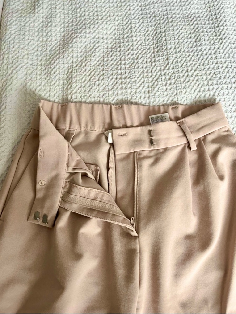 H&M High-Waist Pleated Wide-Leg Trousers in Light Beige